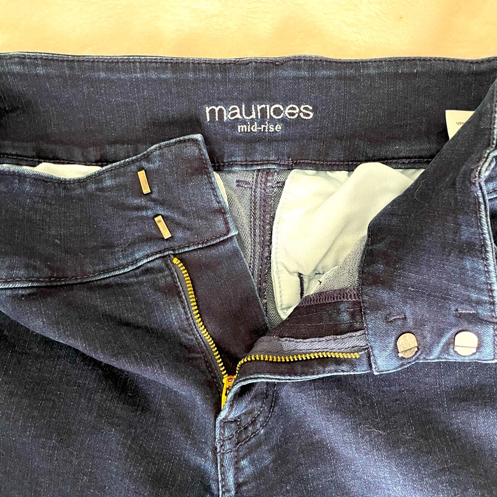 Maurice’s mid rise dark split flare 8